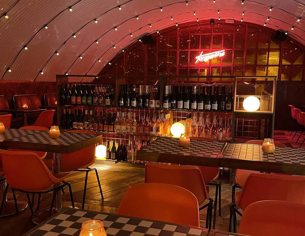 tangerine arches tables bar