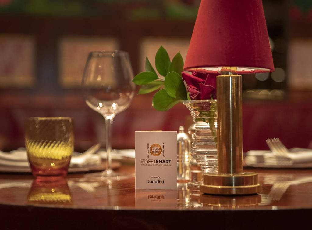 glasses on table with lamp