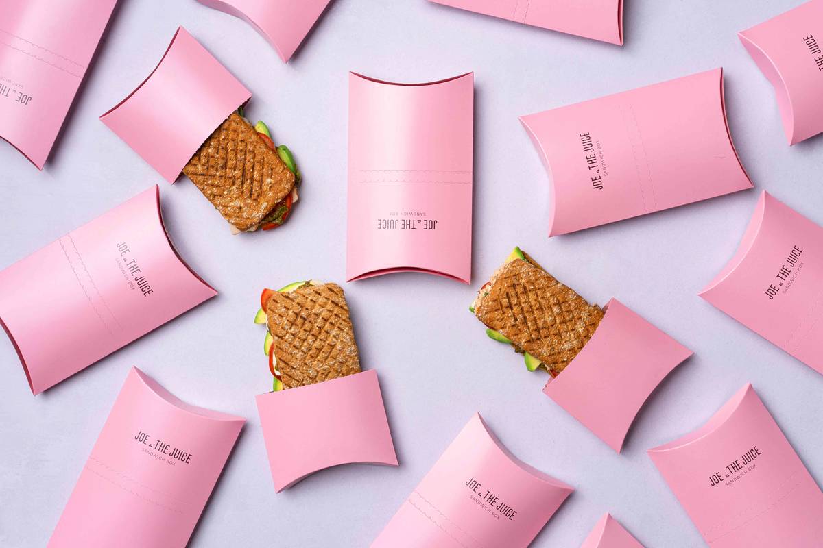 joe and the juice tunacado sandwiches and pink takeaway boxes