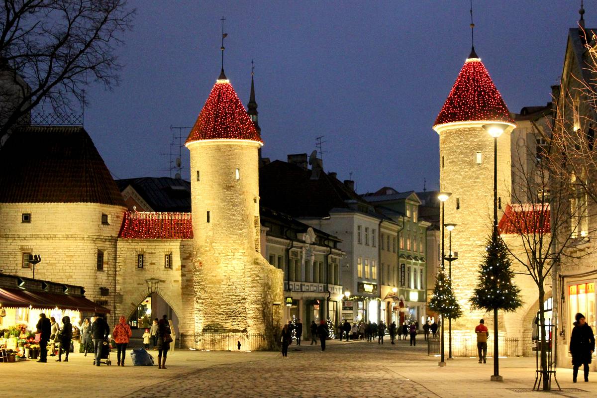 red turrets with lights on in tallinn old town