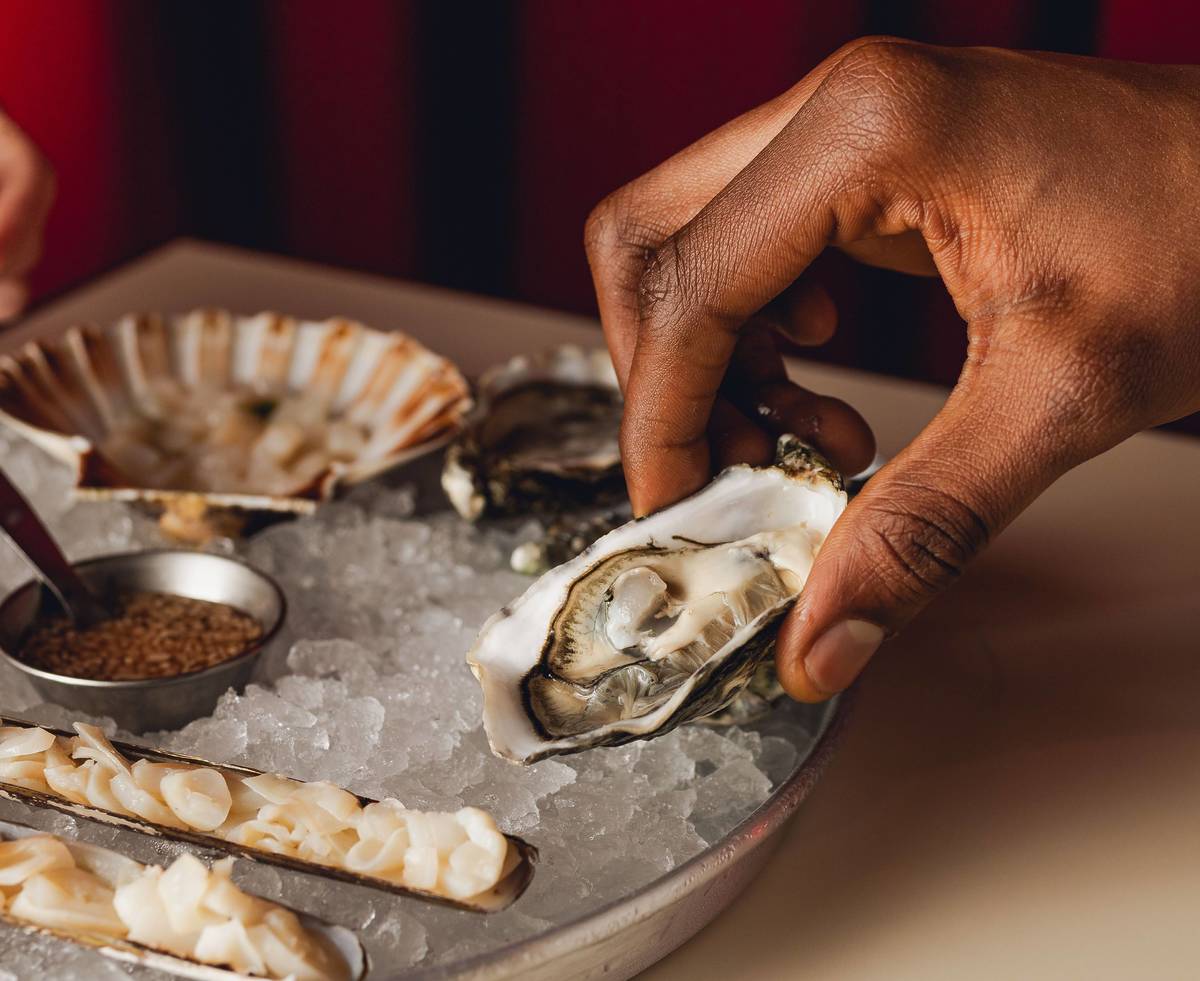 selection of seafood on ice at bar shrimp manchester