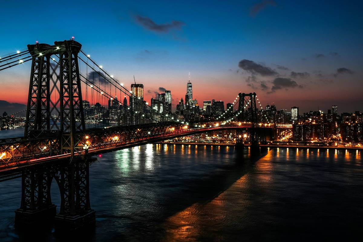 new york skyline manhattan bridge sunset