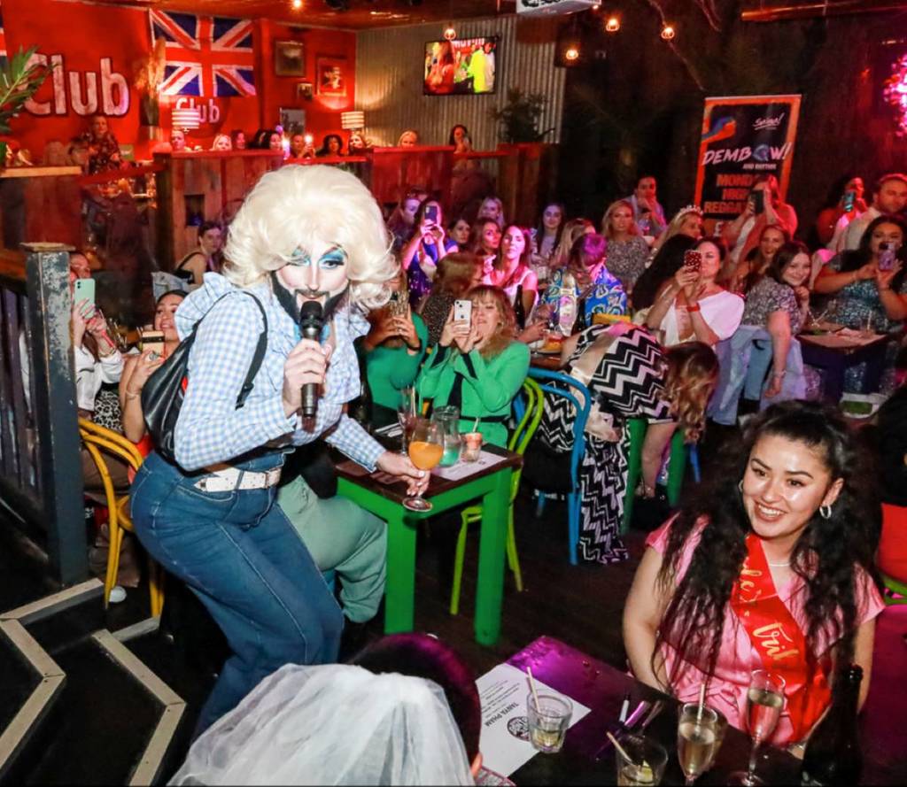 bottomless brunch drag queen performing