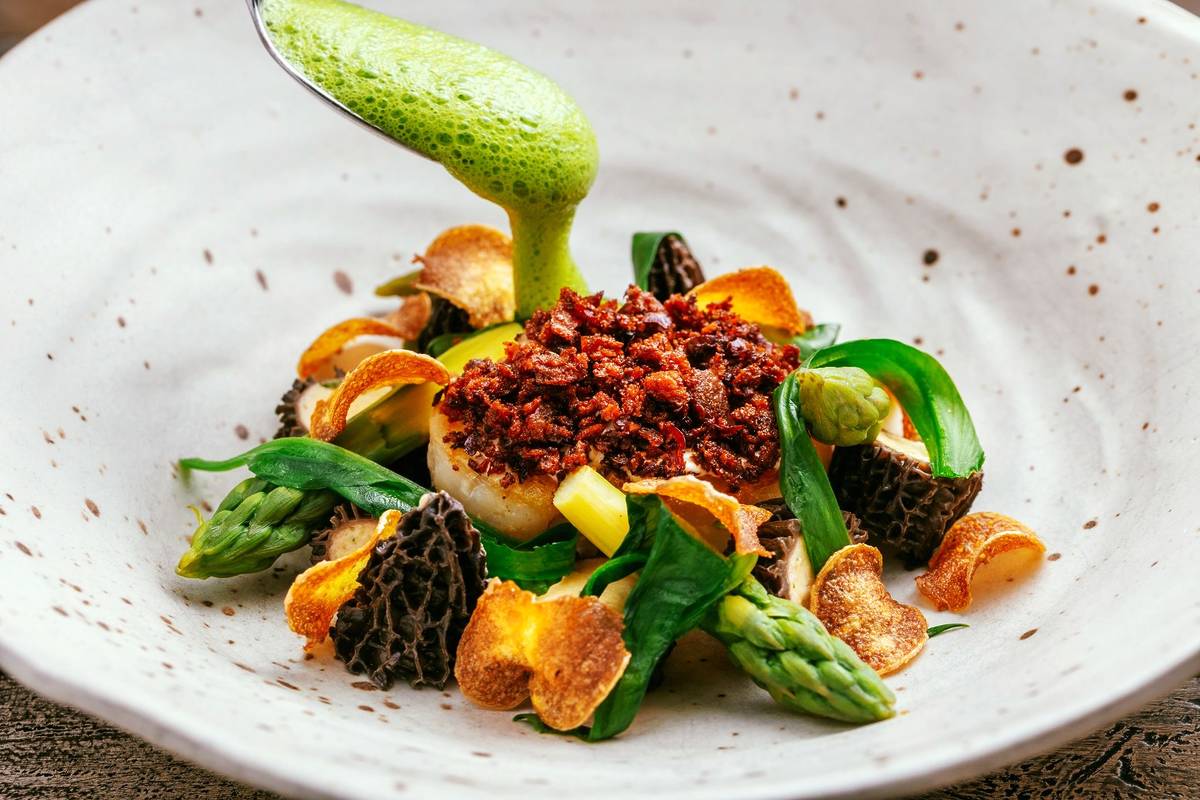 Cod loin, Jersey Royals, asparagus, morel mushrooms, fermented wild garlic sauce