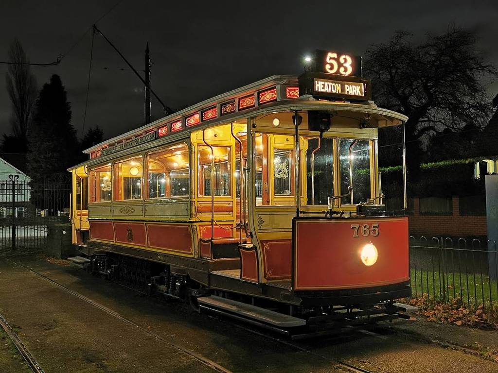 Heaton Park tram on tracks at night