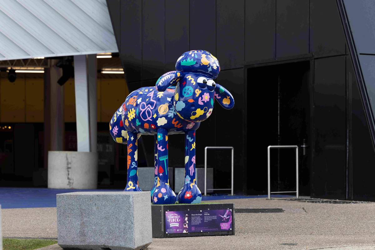 patterned shaun the sheep sculpture outside aviva studios manchester, part of find the flock trail which is coming to bury, greater manchester