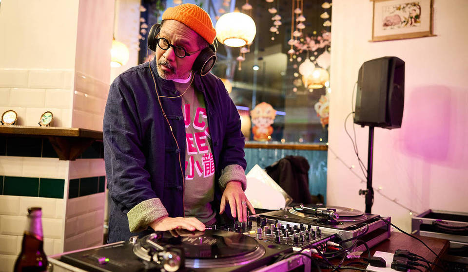 Iconic Manc illustrator Stanley Chow is playing an exclusive DJ set in Manchester next week, and it’s completely free – his historical DJ career & how to make sure you’re there