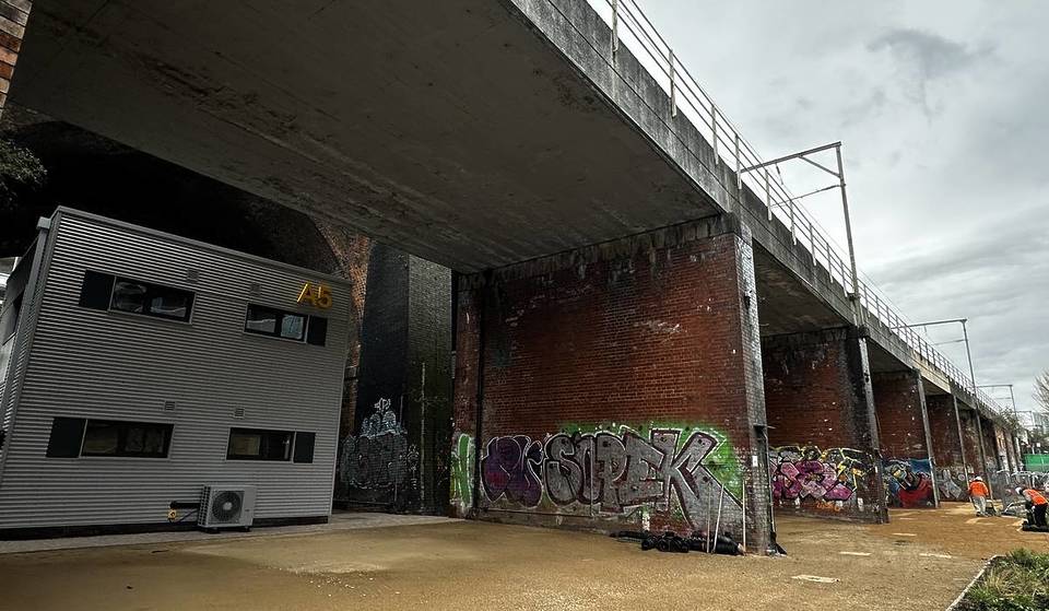 A first-of-its-kind village & training space for homeless people has been completed under these Manchester railway arches — here’s a look inside