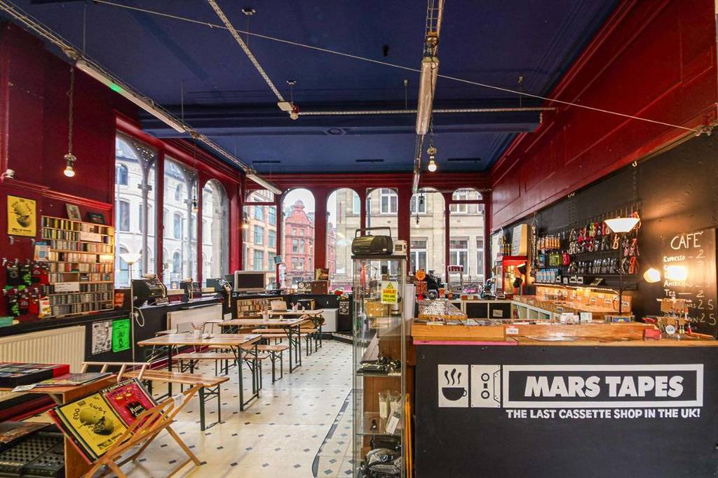 The last cassette shop in the UK is right here in Manchester, and it’s expanding within the city’s most iconic emporium – featuring a new listening café & party weekend with a DJ set from Dave Haslam