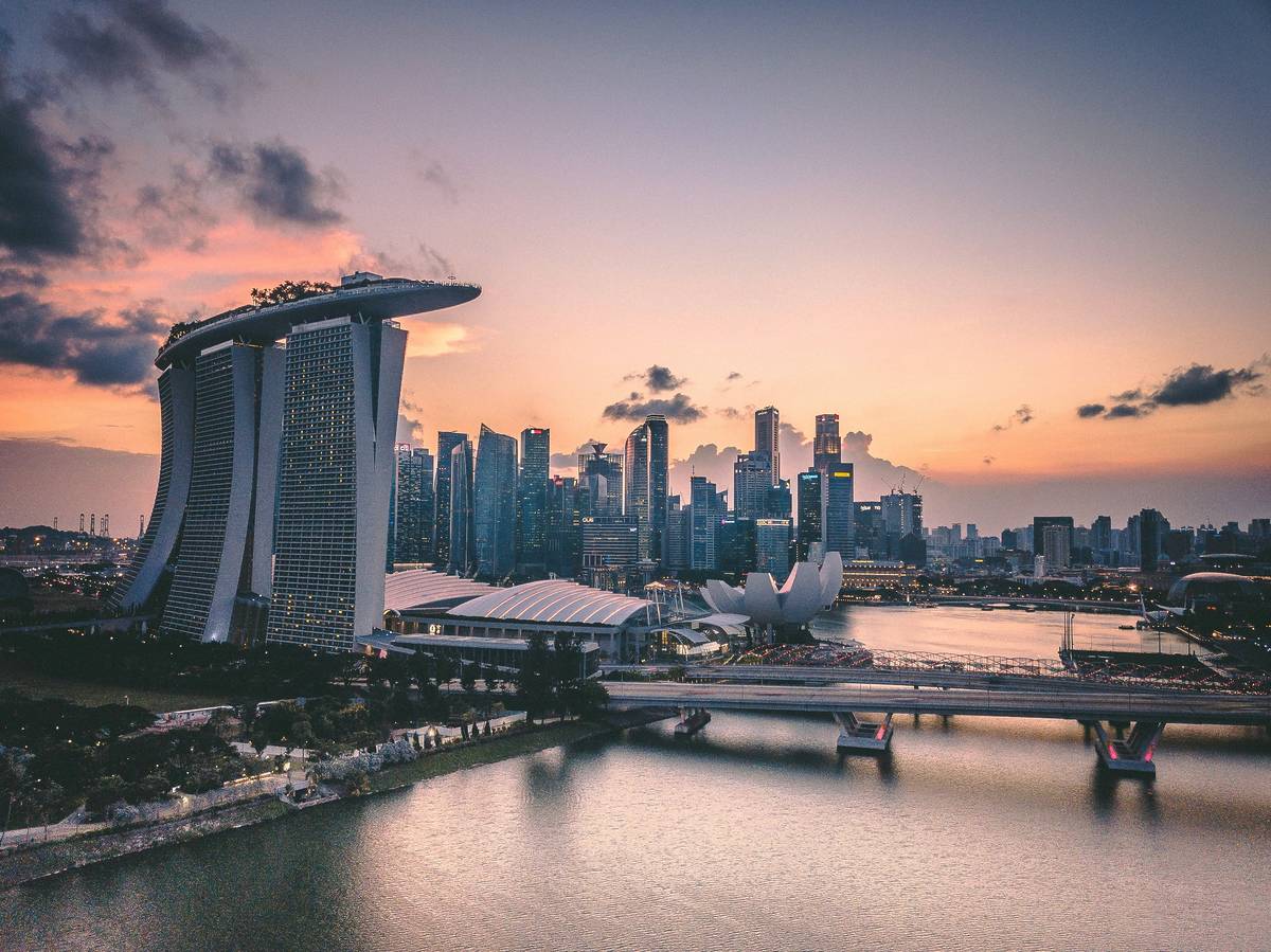 singapore city skyline sunset cheapest flights manchester march