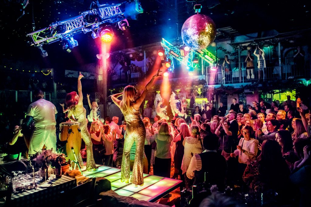 people dancing at mamma mia the party at the o2 in london