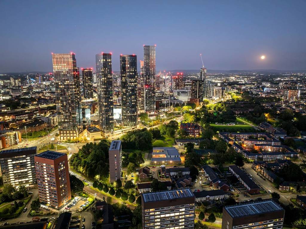 manchester moon night time city skyline