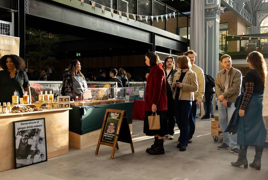 people looking at stalls