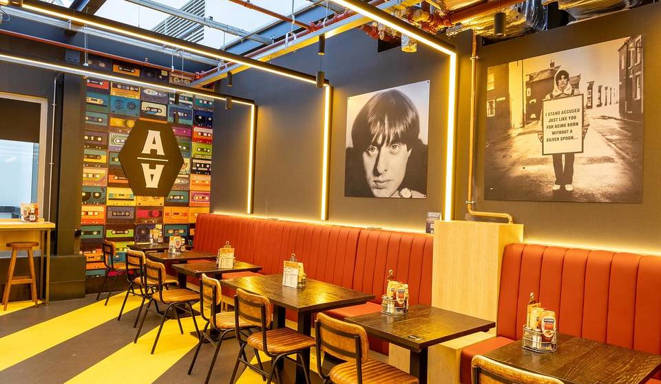 Manchester Airport has unveiled a huge Haçienda-themed extension to its iconic Terminal 2 bar — featuring vinyl decks, live DJ sets, beer from Seven Bro7hers &amp; 100 additional seats