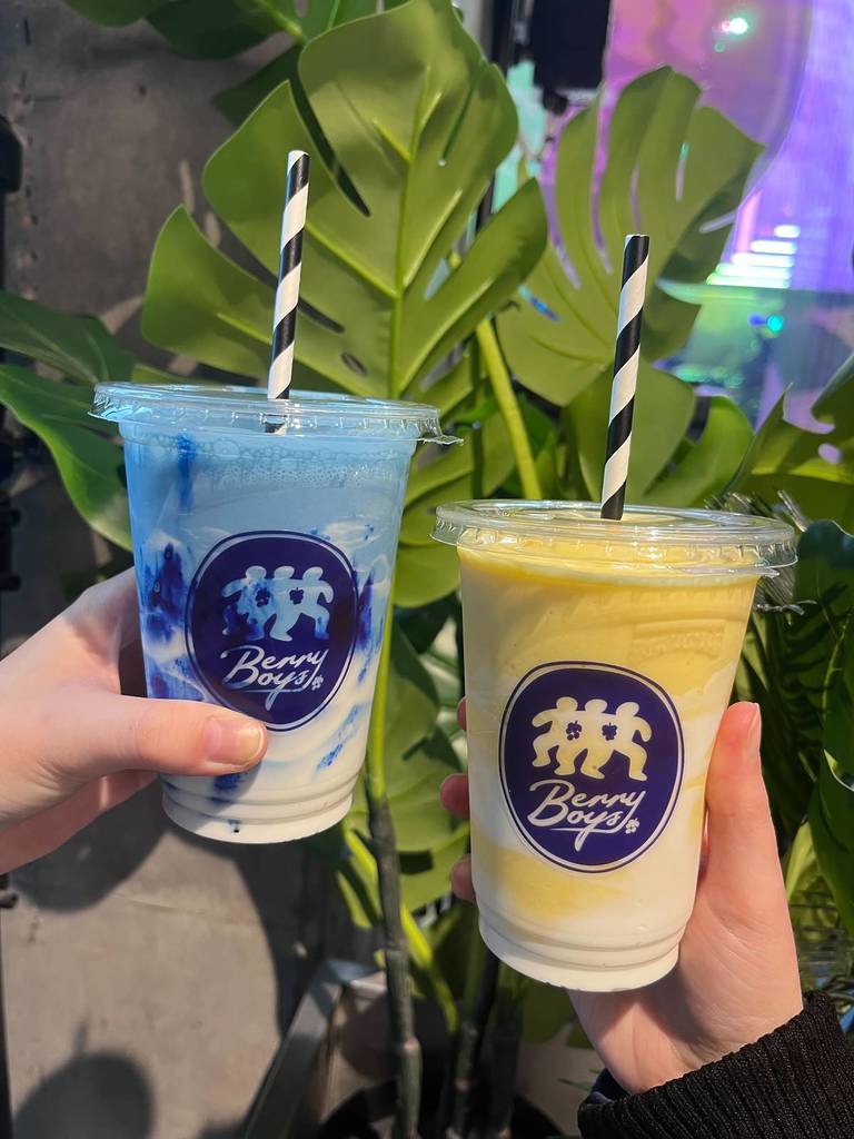 two berry boys manchester smoothies one blue and one yellow