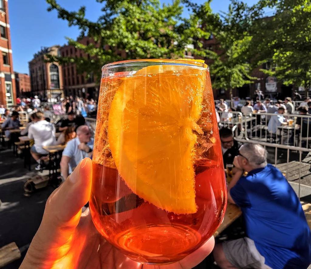 aperol held in hand