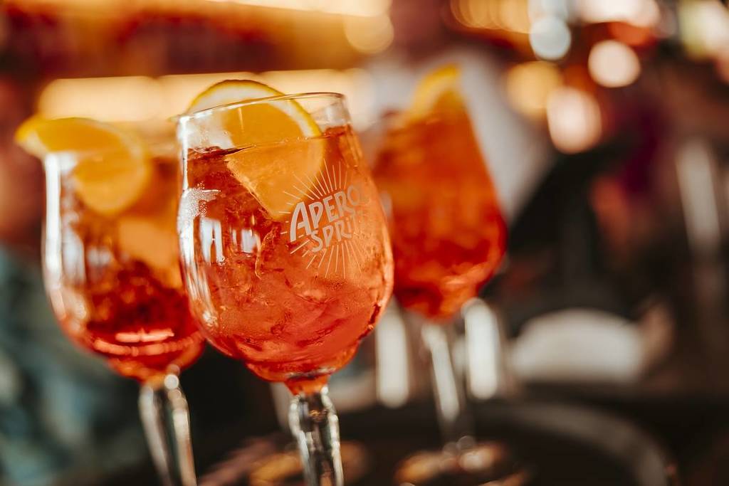 close up shot of aperol spritzes