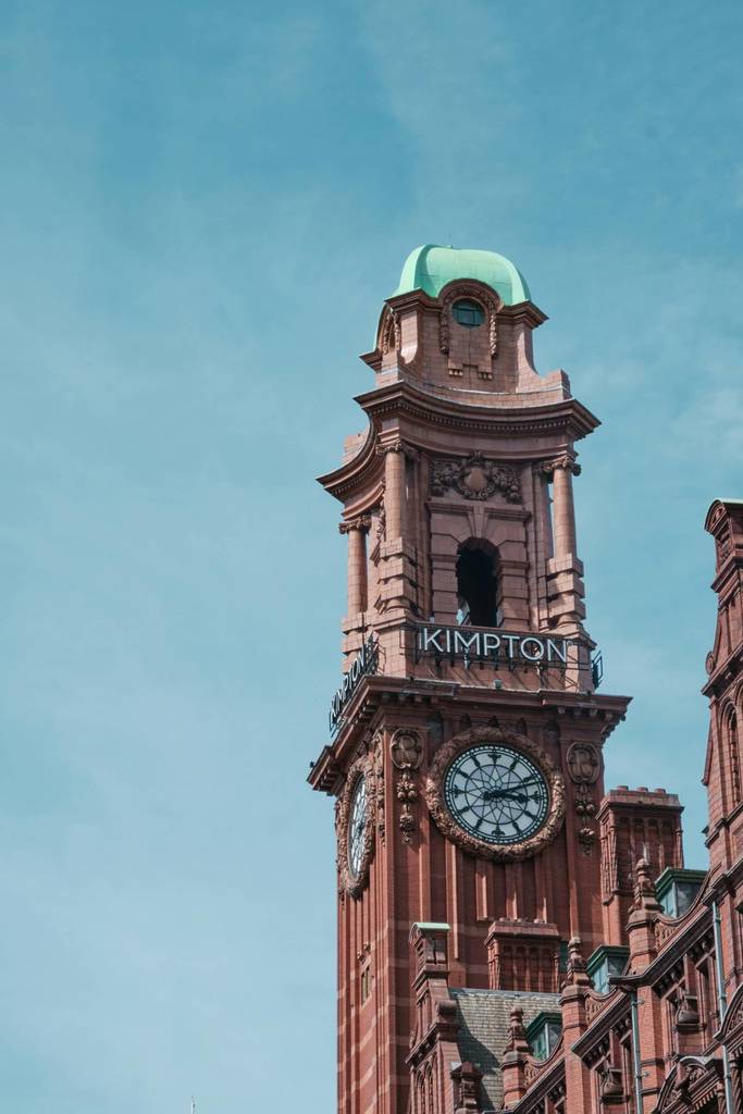 kimpton clocktower hotel in manchester with clock showing bees instead of numbers
