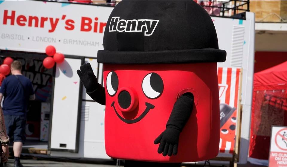 A Henry double-decker tour bus is heading to Manchester to celebrate 45 years of the iconic vacuum cleaner – complete with games, prizes and a giant mascot