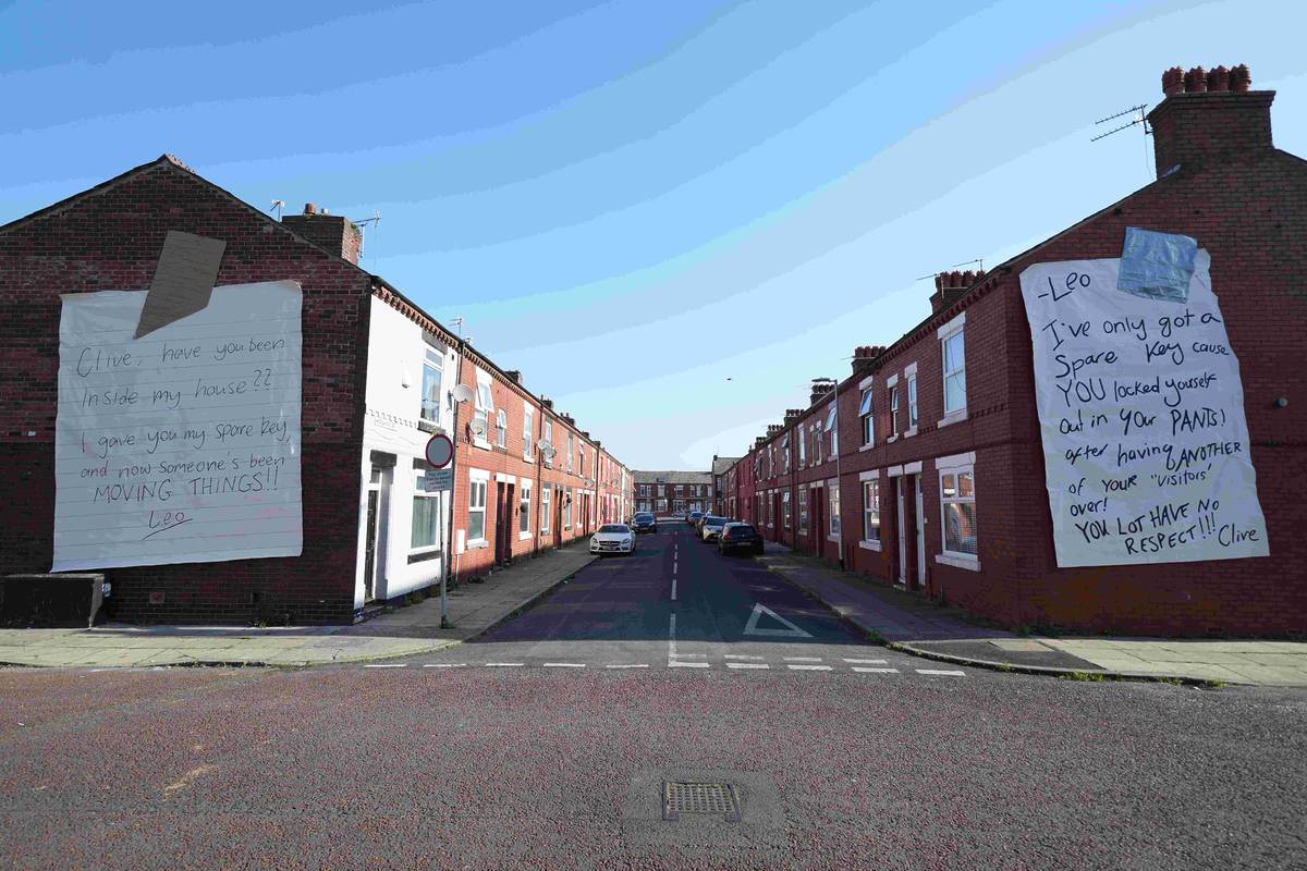 ‘Massive Aggressive Notes': The real reason why giant, angry letters have been appearing on houses in Salford this week