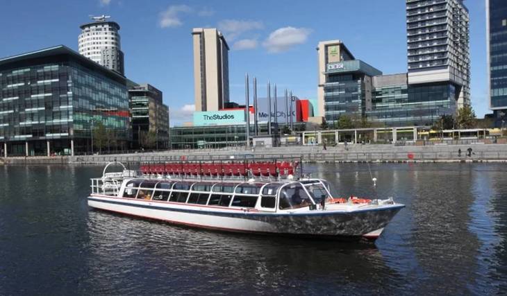 The hour-long Salford boat tour that sails past the ‘Coronation Street’ set and a hidden island — complete with an onboard bar and open-air deck