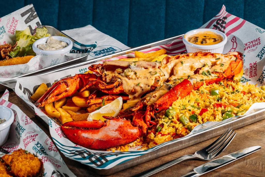 shrimp shack sharing platter with lobster and rice