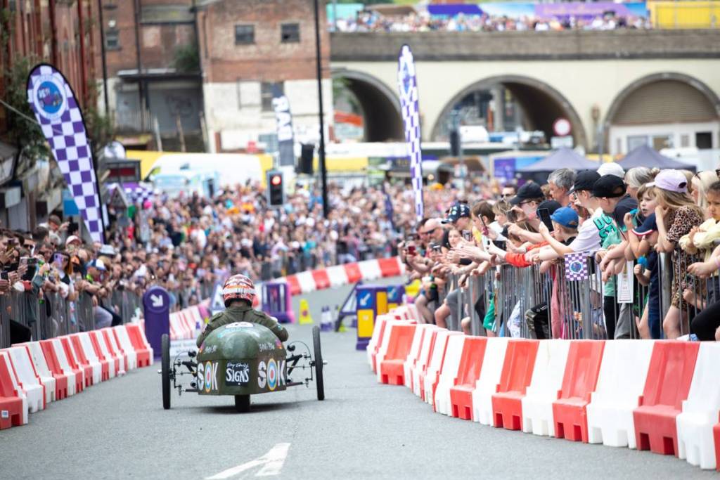 soapbox wheeling through stockport as part of krazy races event
