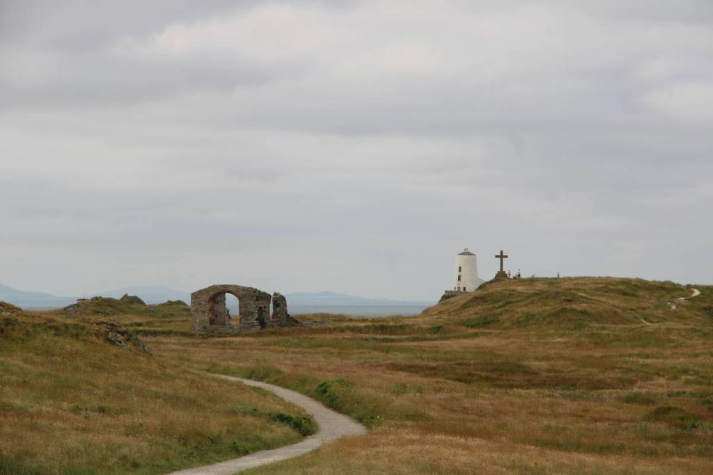 Tŵr Mawr lighthouse on top of Ynys Llanddwyn tidal island in anglesey, wales