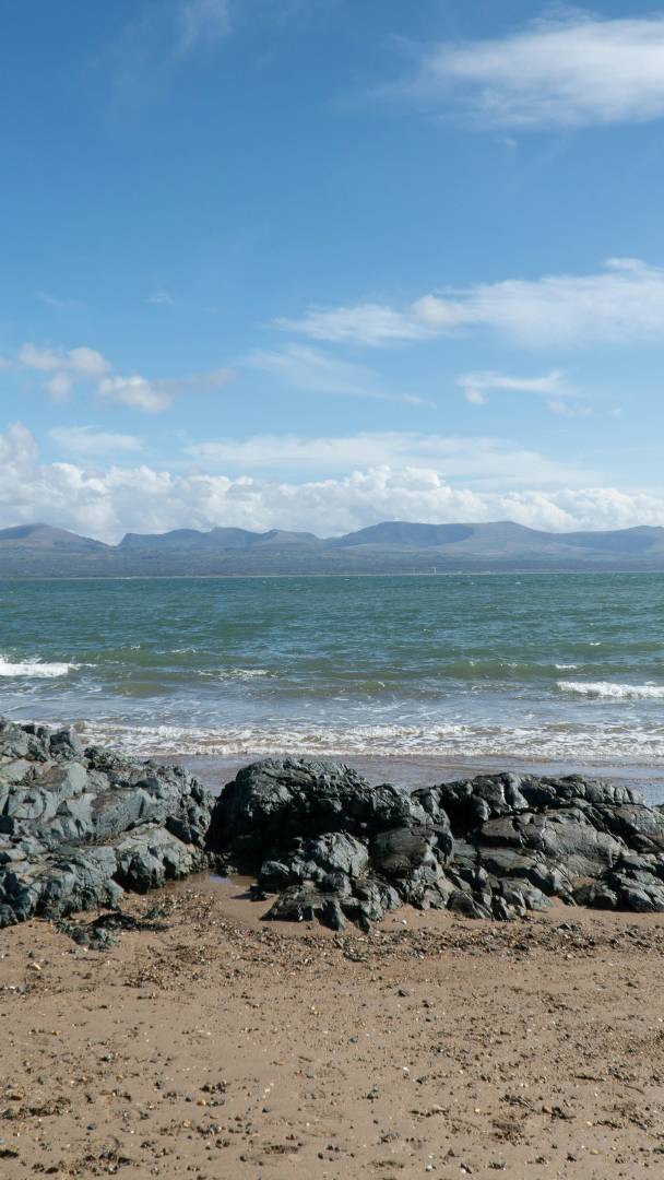Just a 2-hour drive from Greater Manchester: the beach named one of the UK's best by The Times boasts a 3-star water quality score, a tidal island and historic lighthouse