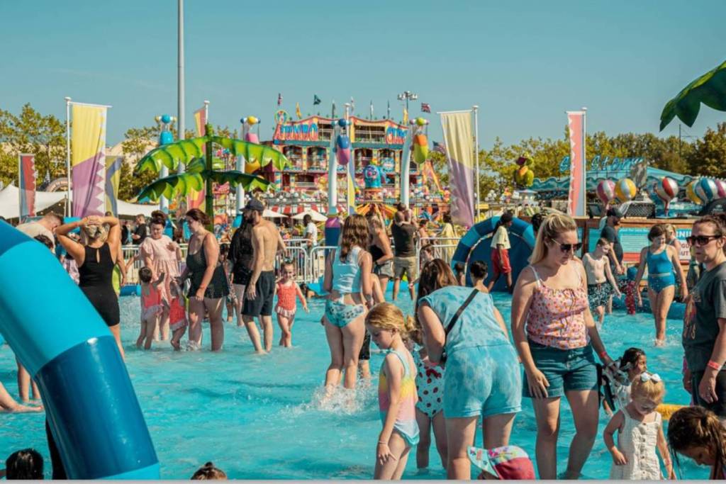 people at trafford summer fair splash park