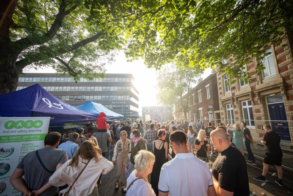 groups of people at stalls at bury food and drink festival
