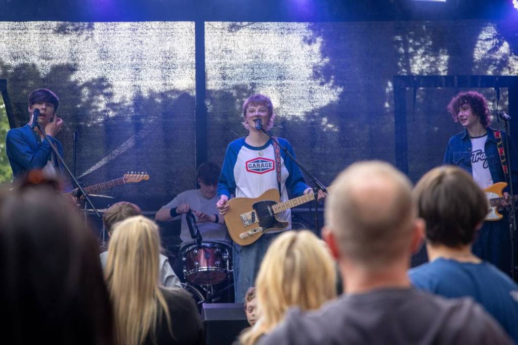 band performing on stage at the rock, bury