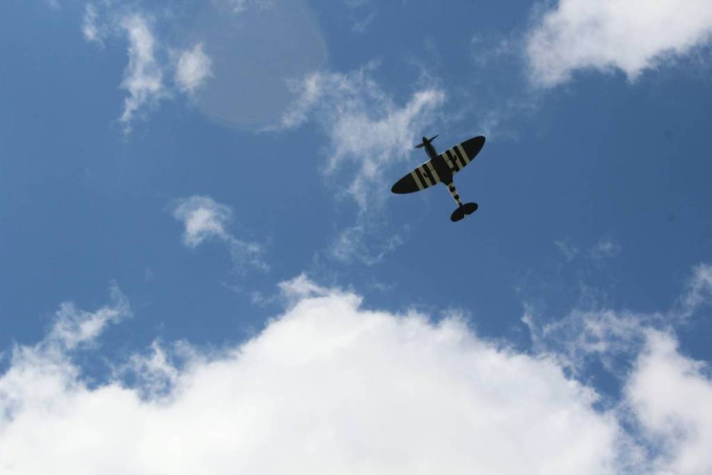 spitfire flying in sky