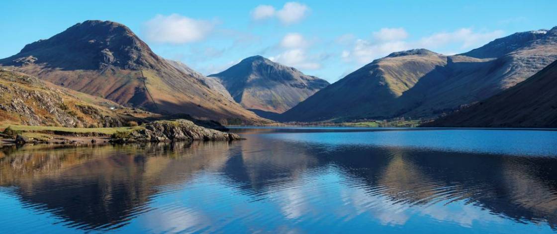 Two of the most difficult hikes in the UK are located in the Lake District, and neither is Scafell Pike – but it’s also home to an easy walk around one of England’s most photogenic lakes
