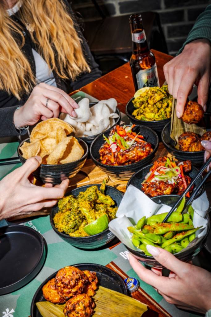 selection of Asian dishes at Banana Tree restaurant including prawn crackers and edamame beans
