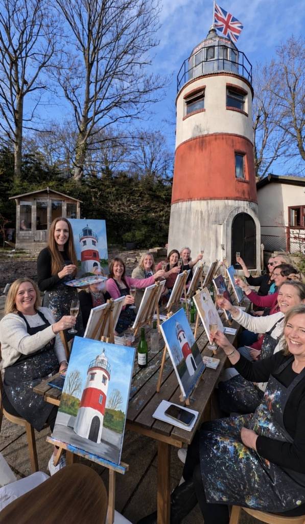 people painting monton lighthouse next monton lighthouse near bridgewater canal, salford