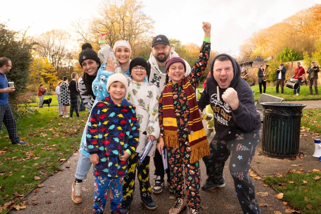 family dressed in pyjamas at heaton park for pyjama walk