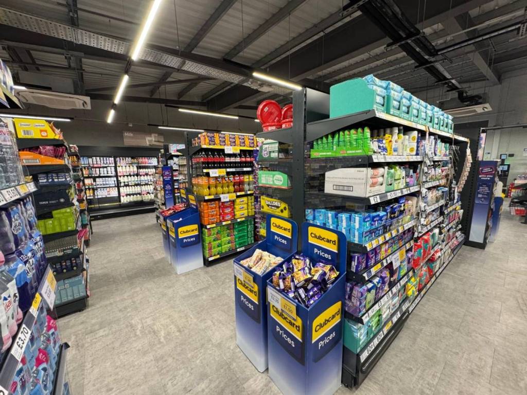 rows of shelves inside new tesco store