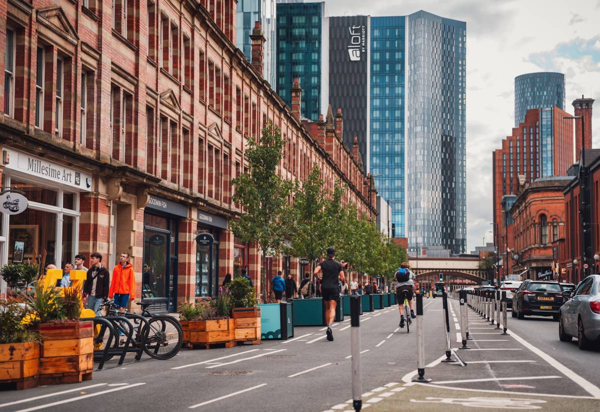 “The city is on a mission”: A 90m stretch of Manchester's Deansgate has been transformed with 12 sweet gum trees and beehive planters made from upcycled Velodrome track wood