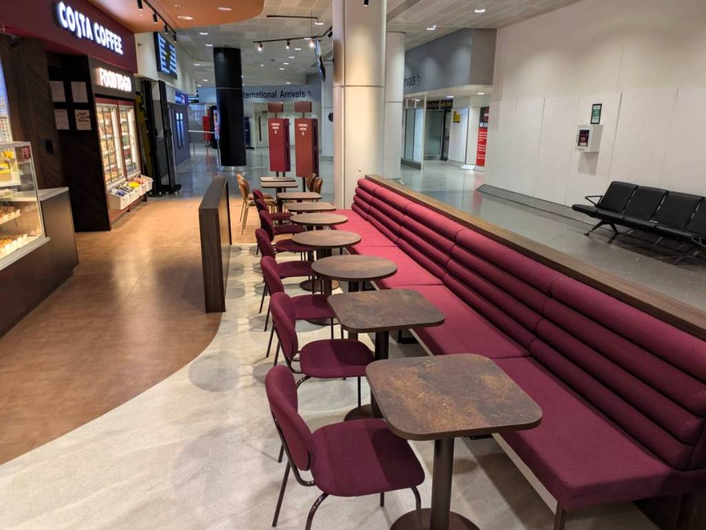 seating area inside new costa coffee store at manchester airport T3 arrivals