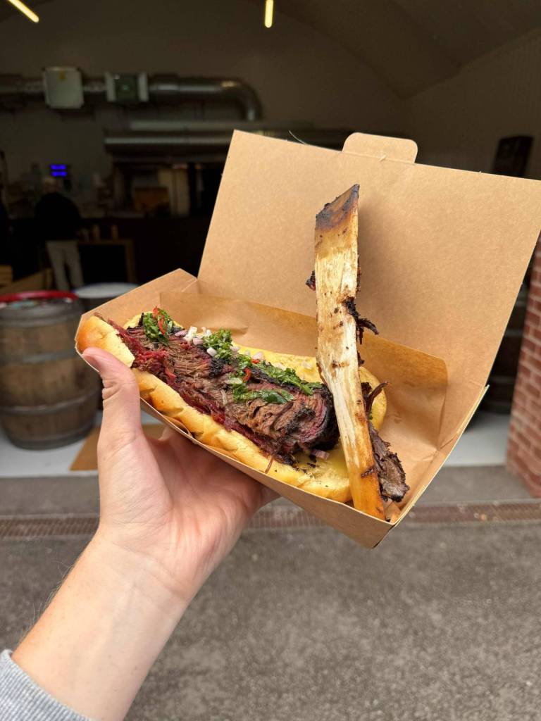 giant short rib sandwich with bone on side