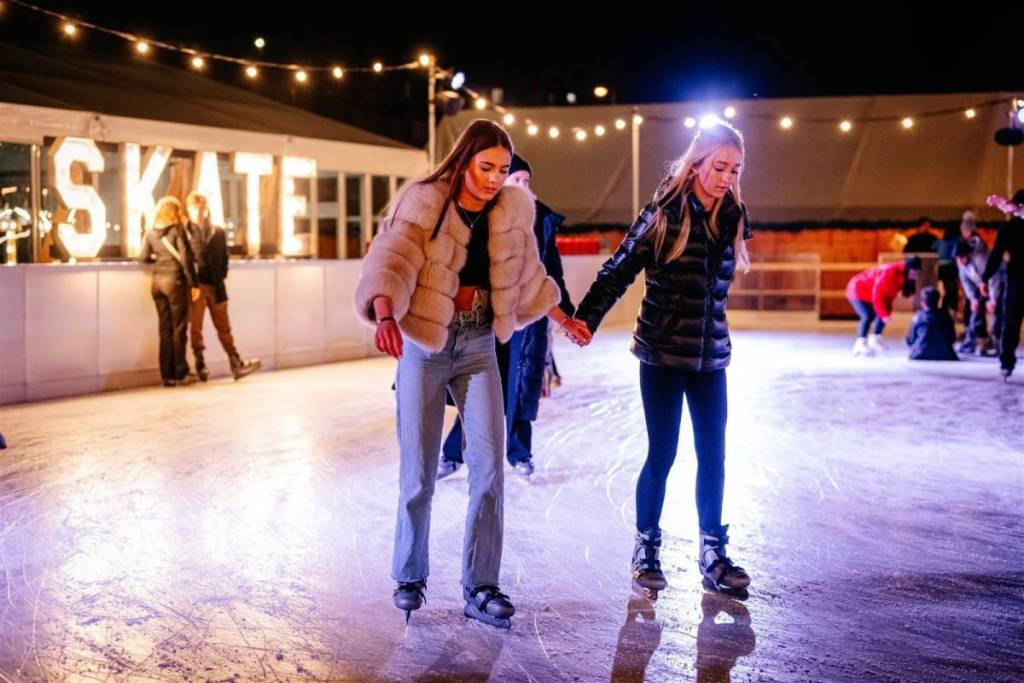 two women skating on ice rink at lytham on ice event