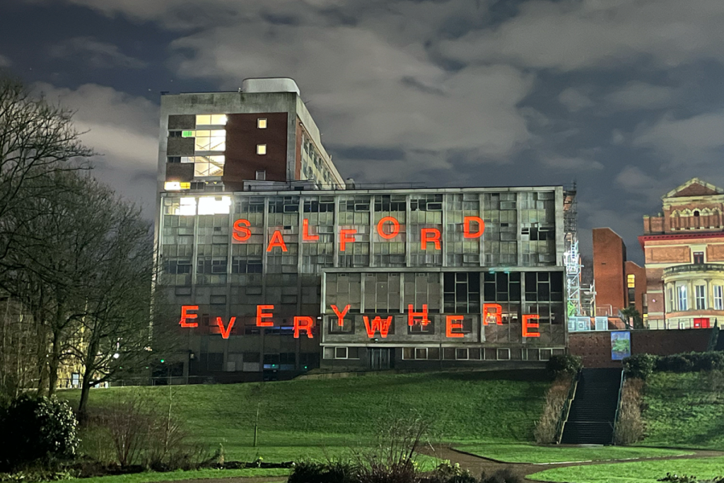 salford everywhere across maxwell building at night