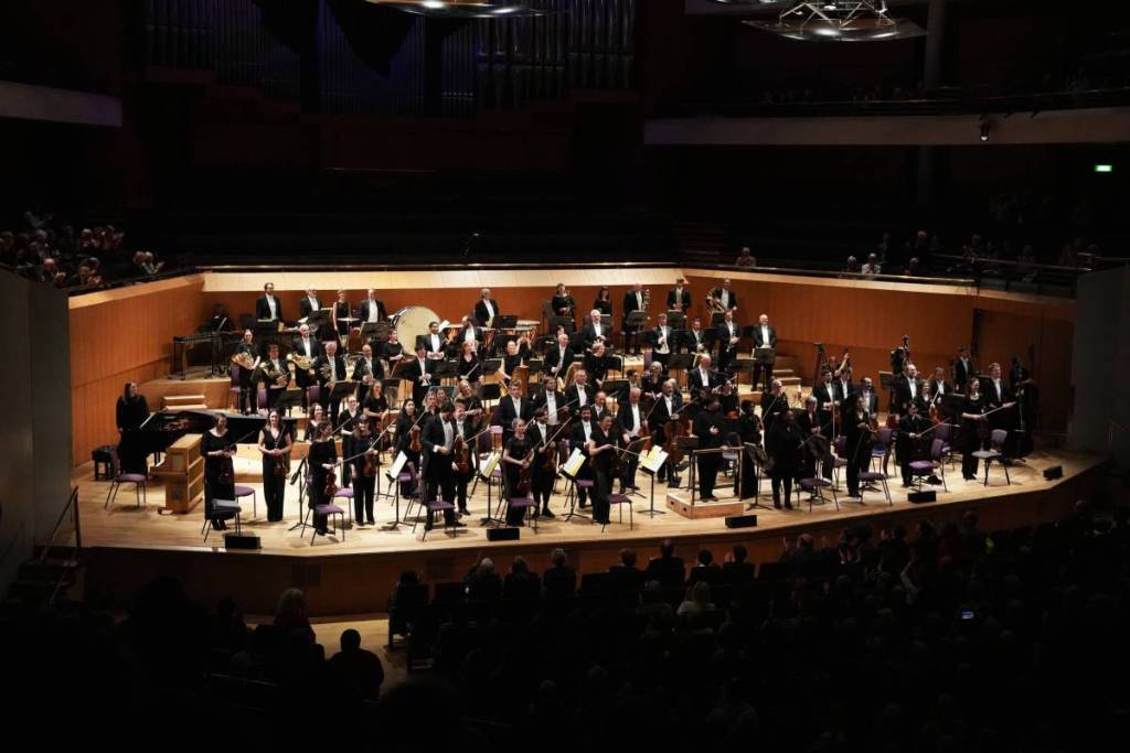 hallé orchestra playing on stage