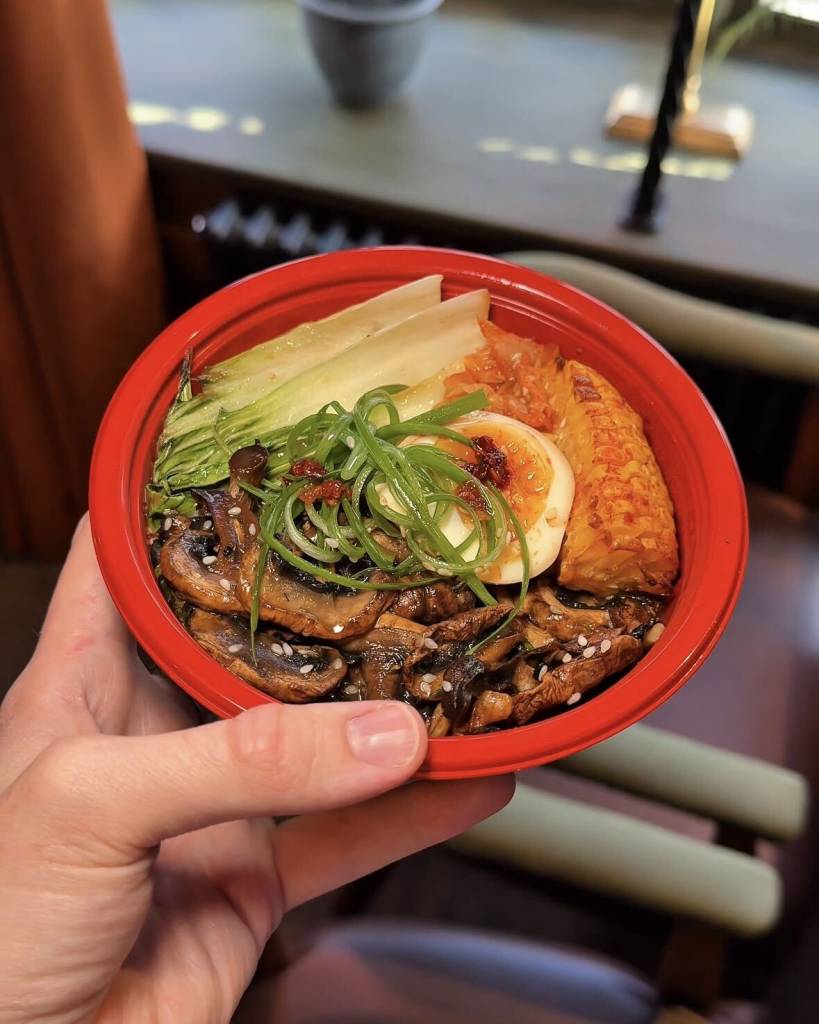 bowl of ramen in red bowl
