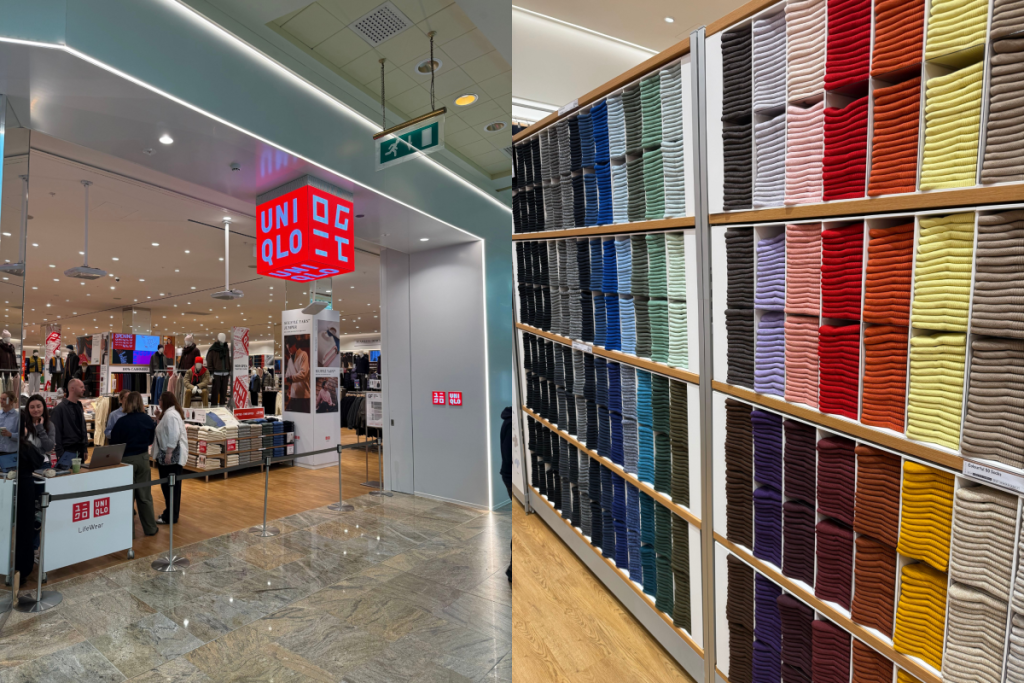 outside uniqlo trafford centre store with logo on entrance on left hand side and rows of different colour folded sweaters in shop on right hand side