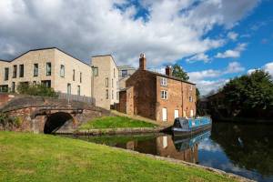 In 1800, Manchester built a solitary brick cottage beside Lock 2 of the Ashton Canal; over 220 years later, the two-storey relic stands completely preserved in the shadow of luxury high-rises