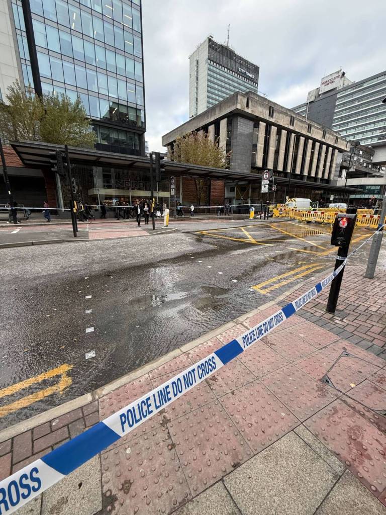 portland street in manchester cordoned off by police tape