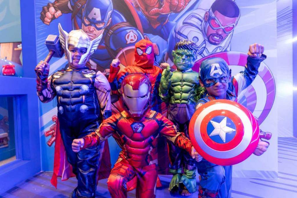 A group children dressed up as Marvel superheros at مهرجان قطر للألعاب