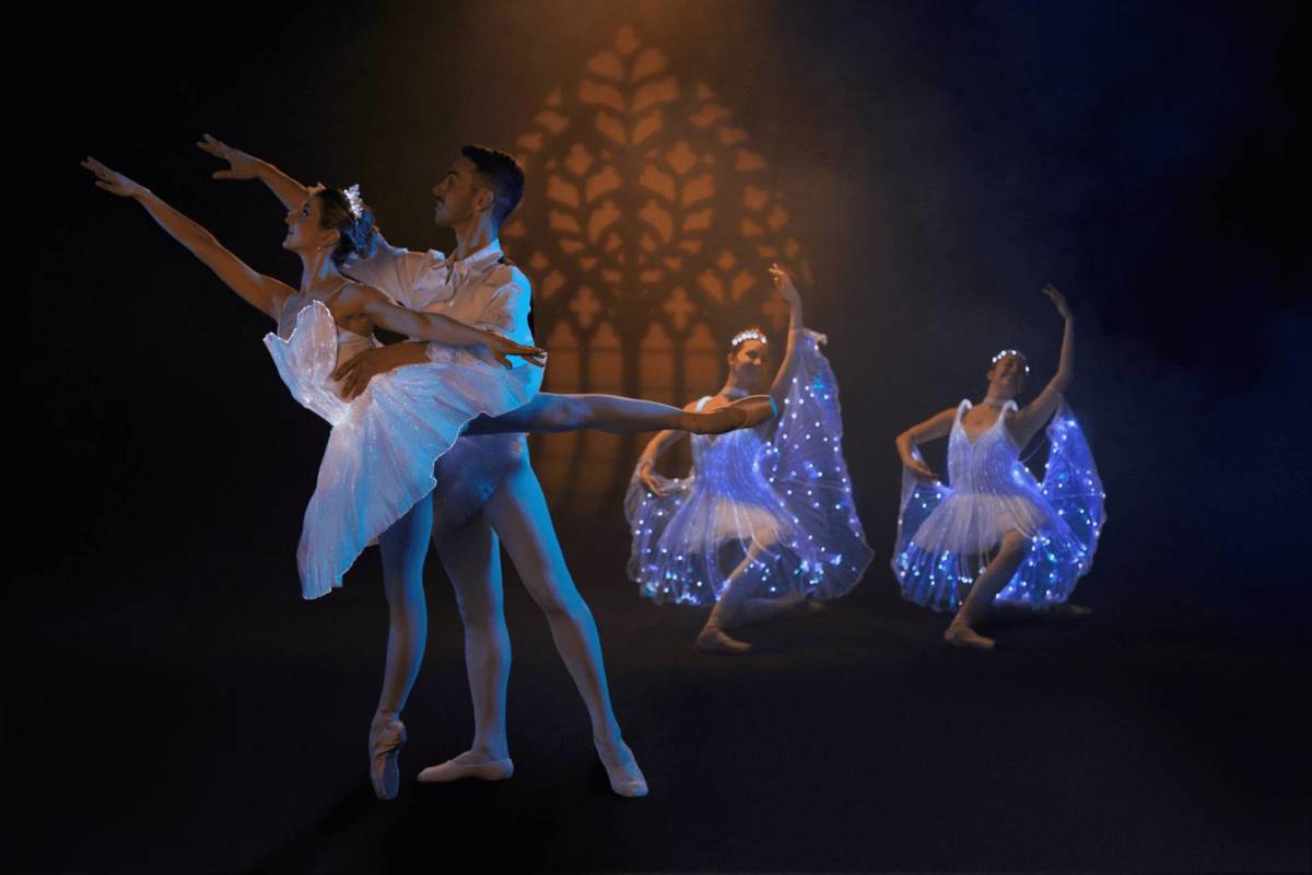 Dancers performing at a Ballet of Lights: Sleeping Beauty performance